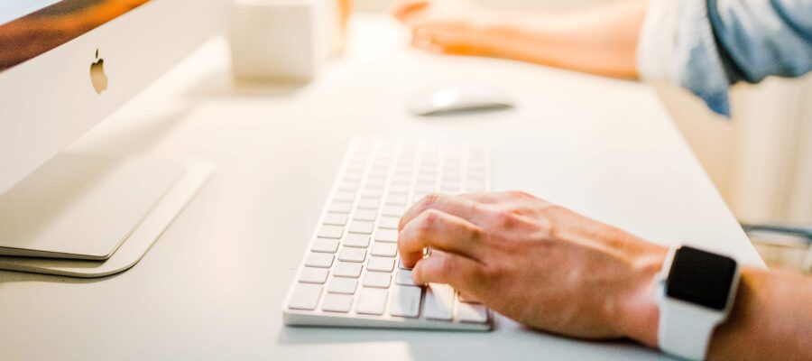 Computer keyboard and hands