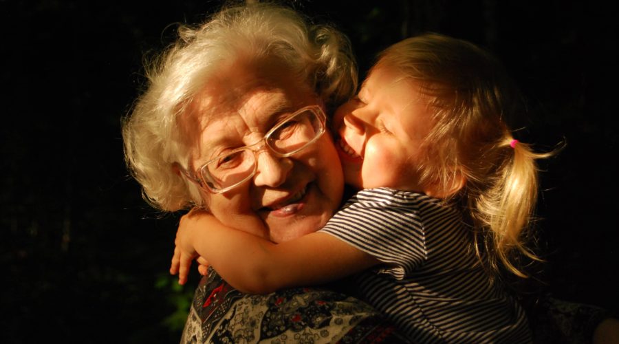 Granny hugs grandaughter