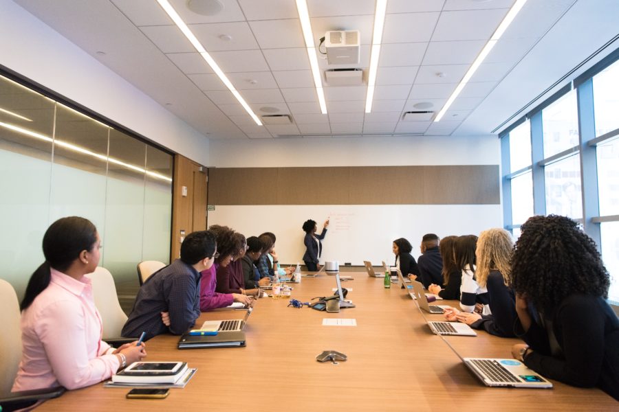 People at an AGM in a boardroom